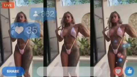 Blonde girl kneels naked in bathroom, gets up close
