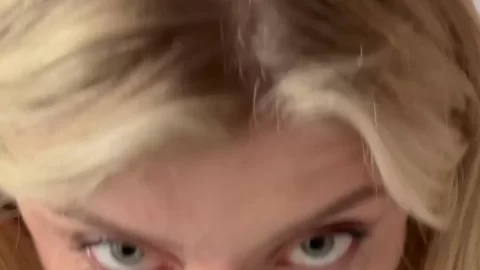 Blonde girl plays with dildo