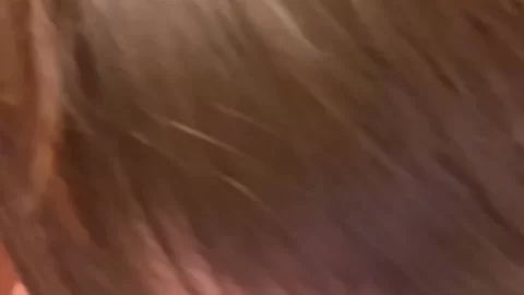 Brunette Girl Plays with Ice Cube