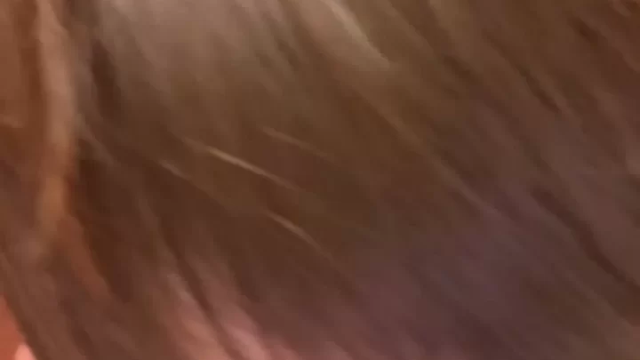 Brunette Girl Plays with Ice Cube