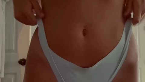 Blonde girl in underwear dancing and stripping