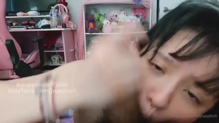 Petite Asian Girl Plays with Pink Toy