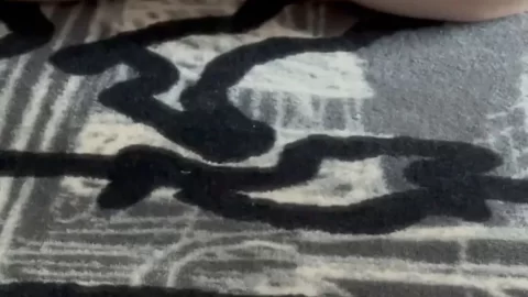 Blonde girl with tattoos masturbates on bedroom rug