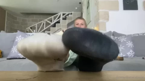 Blonde girl plays with herself on couch