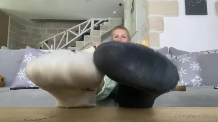 Blonde girl plays with herself on couch