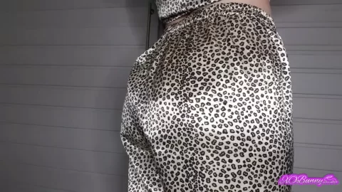 Redhead in Leopard Outfit Shows Off