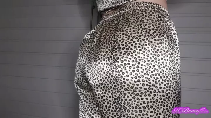 Redhead in Leopard Outfit Shows Off