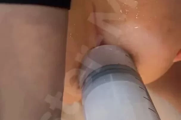 Blonde Petite Girl Cleans Pussy with Douche