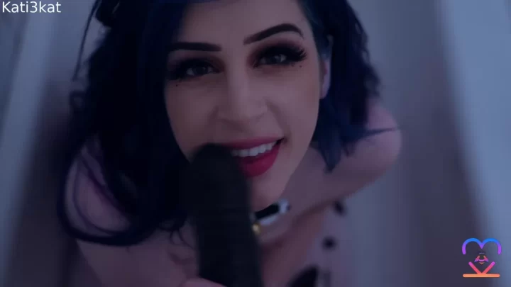 Dark Haired Girl Plays with Dildo in Bathtub