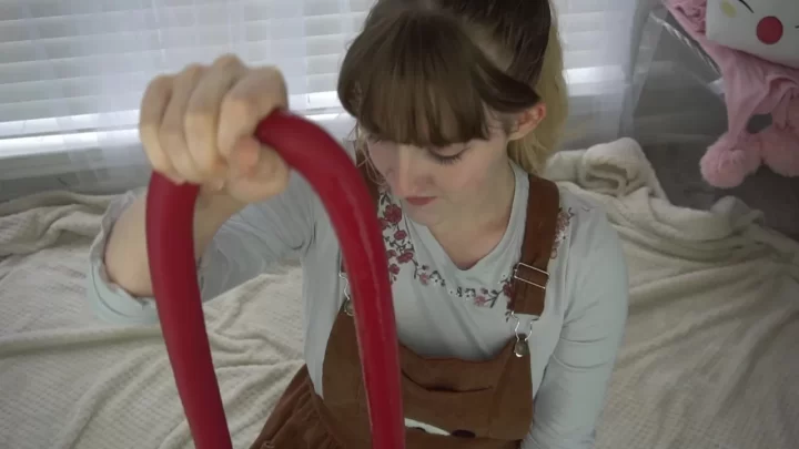 Blonde teen with pierced nose fucks herself with red dildo