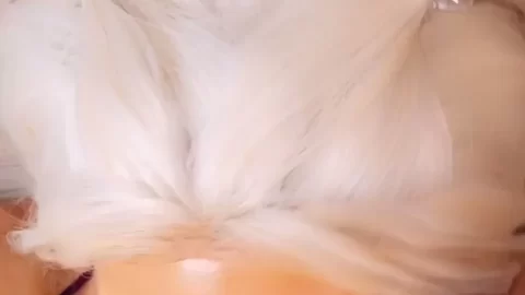 Blonde girl plays with herself and a toy