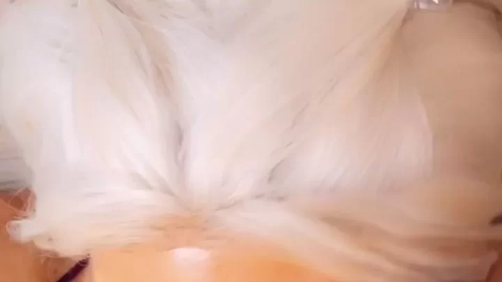 Blonde girl plays with herself and a toy