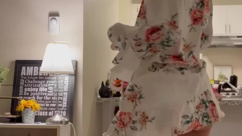 Blonde girl poses and touches herself in bedroom