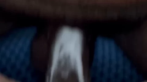 Brunette woman gives white guy blowjob on bed