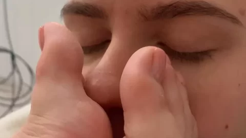 Blonde girl gets foot job from guy
