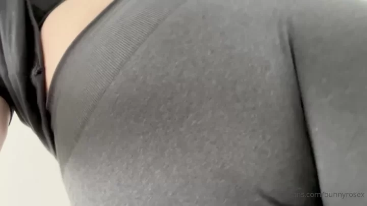 Brunette bends over, shows butt