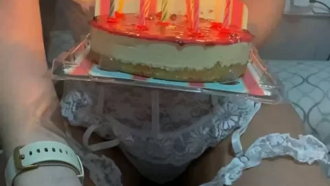White Lingerie, Lit Candles, and a Metal Ball