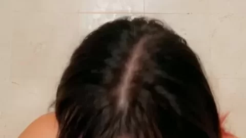 Latina girl plays with pink dildo