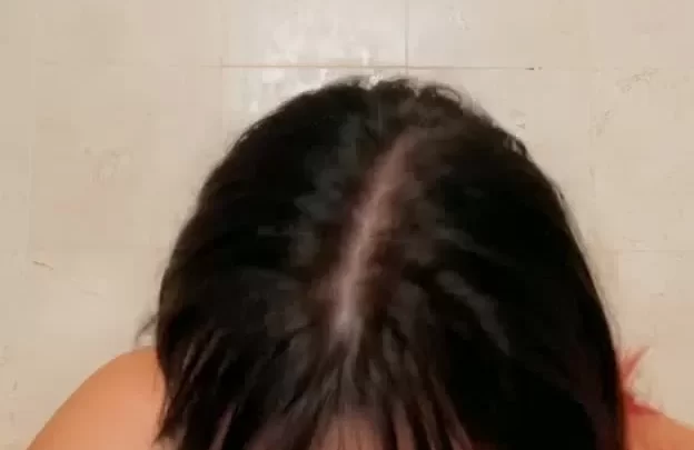 Latina girl plays with pink dildo