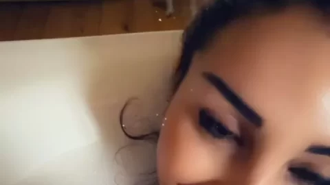 Slim White Girl with Ponytail Fucks Dog in Bathtub