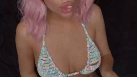 Eating candy in my candy bikini Can you spot my hard nippl