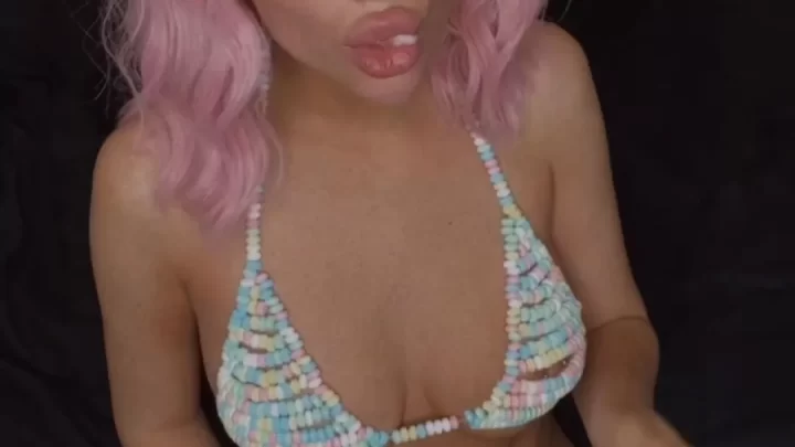 Eating candy in my candy bikini Can you spot my hard nippl