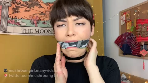 kinda goth asian girl gags herself
