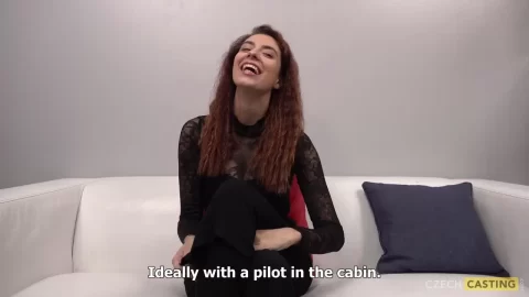 Slim Redhead Girl on Couch Talking and Laughing