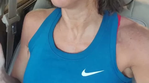 Mature brunette in car selfies