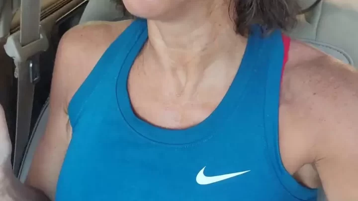 Mature brunette in car selfies