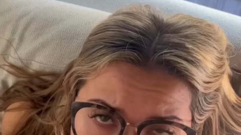 Blonde girl gives oral on couch