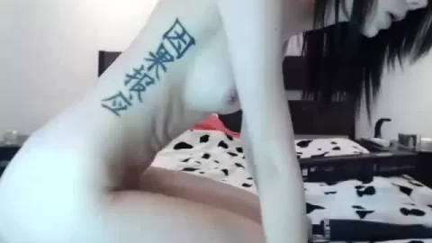 Asian girl plays with vibrator, gets on all fours