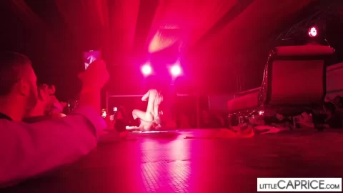 Blonde MILF exposes herself on stage