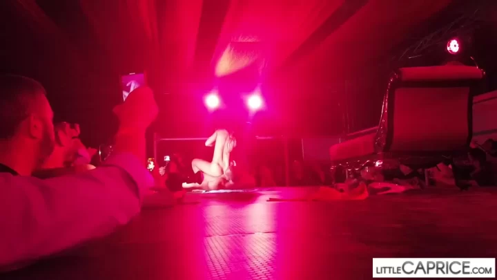 Blonde MILF exposes herself on stage