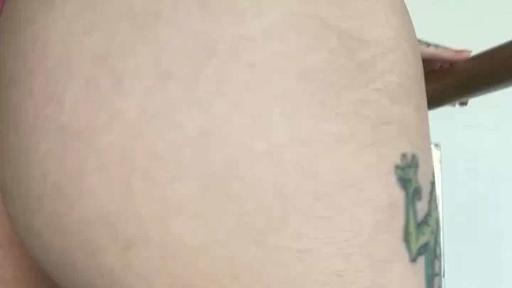 Curvy White Girl with Tattoos Poses Butt