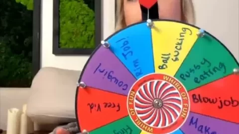 Blonde girl with piercing plays Wheel of Fortune topless