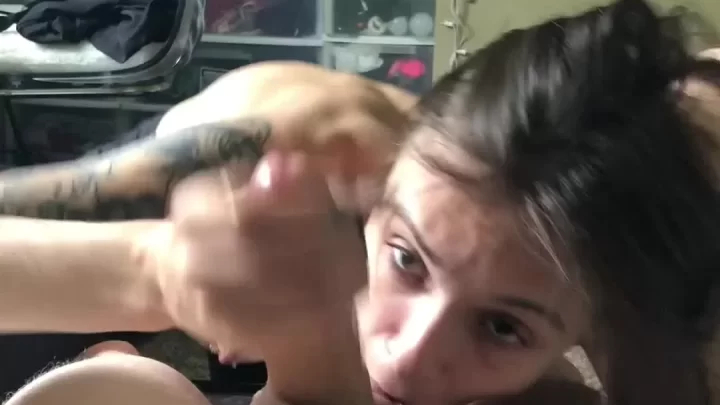 Brunette girl gets blowjob from white guy