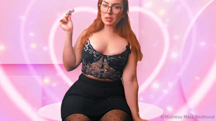Redhead with glasses plays with herself