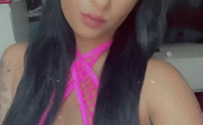 Latina girl in lingerie poses and gets sparkles