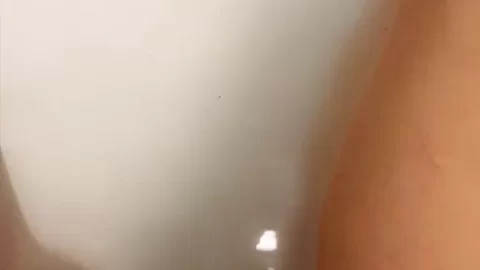 Slim White Girl Masts in Bathroom
