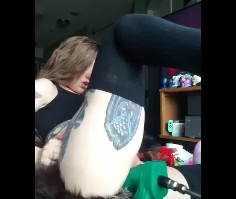 Brunette with tattoos pleasures herself with vibrator
