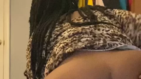 Black Girl with Braids Bends Over