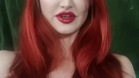 Redheaded Woman Exposes Breasts, Poses