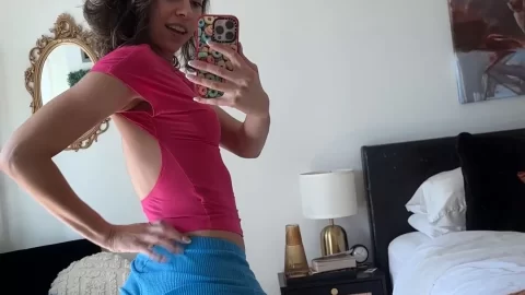 Brunette takes mirror selfie, shows off body
