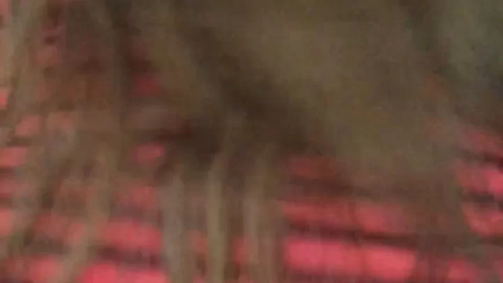 Brunette bends over, shows off her butt