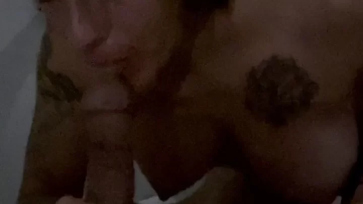 Brunette with chest tattoo fucks self with dildo