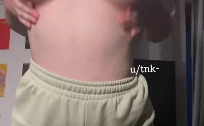 Blonde girl plays with her breasts
