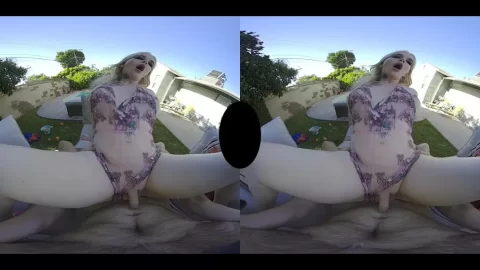 Blonde girl fucks herself on outdoor couch