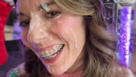 Brunette girl with braces gets messy in kitchen