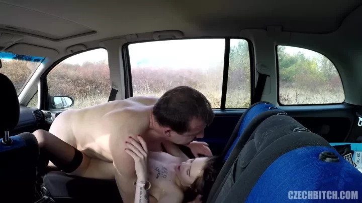 Muscle guy fucks brunette girl in car